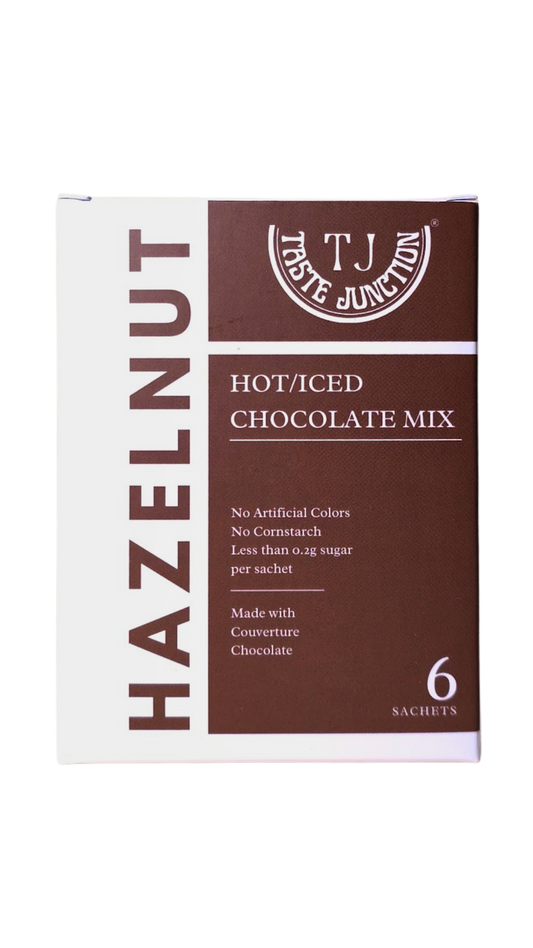 Box of T.J. Taste Junction Hazelnut Hot/Iced Chocolate Mix on a white background